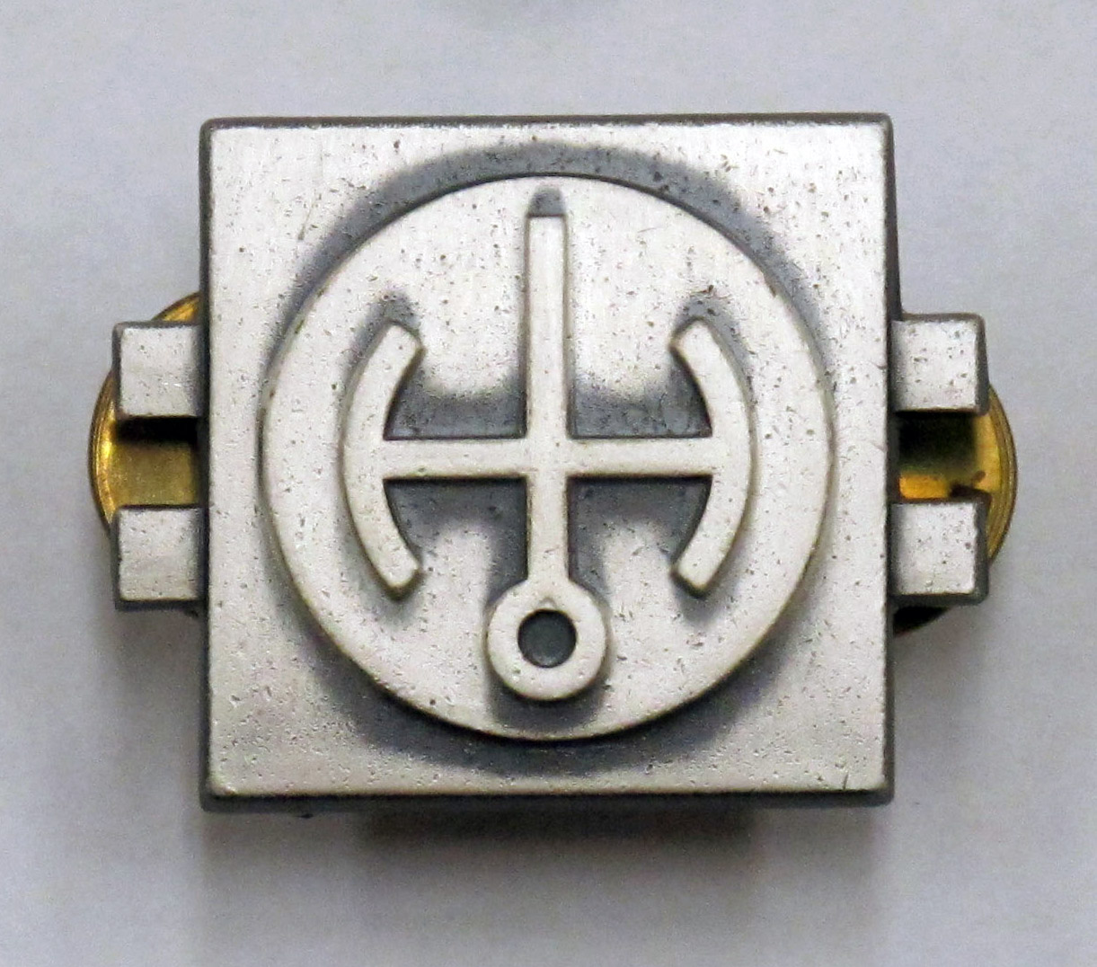 small silver pin